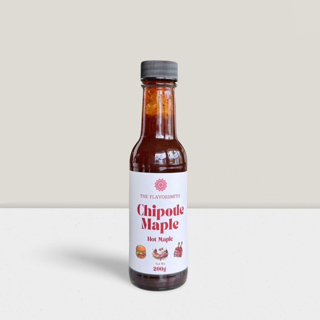 Bottle of Chipotle Maple hot sauce on a light gray background